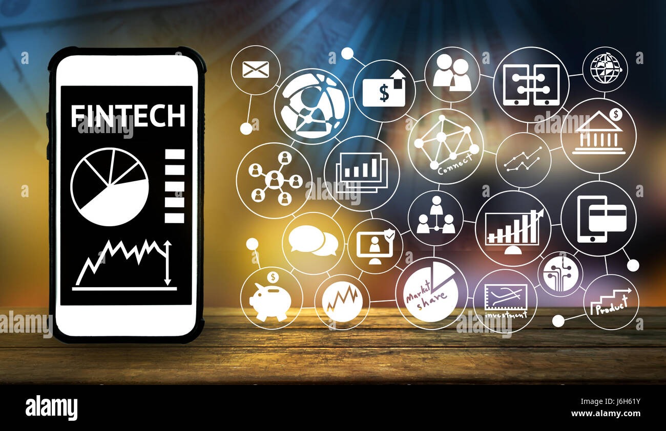 La technologie de l'Internet financier Investissement Fintech Concept. Application Smartphone , , , l'icône connexion billets floue et abstraite sur fond bois t Banque D'Images