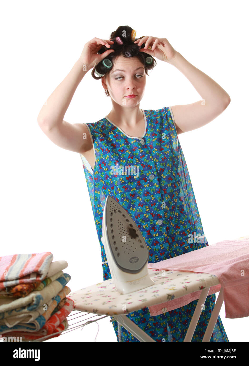 Robe Tablier Tablier Blouse femme de blanchisserie Planche à repasser Fer à  friser Blouse femme Photo Stock - Alamy