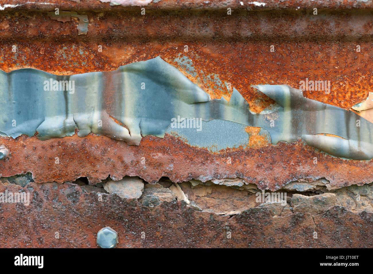 Détail de rusty metal surface avec de la peinture Banque D'Images
