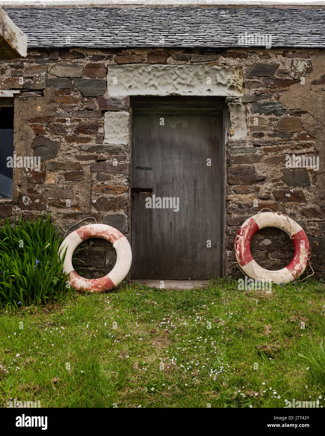 Ceintures à porte de maison en pierres sur Kintyre, Argyll and Bute Banque D'Images