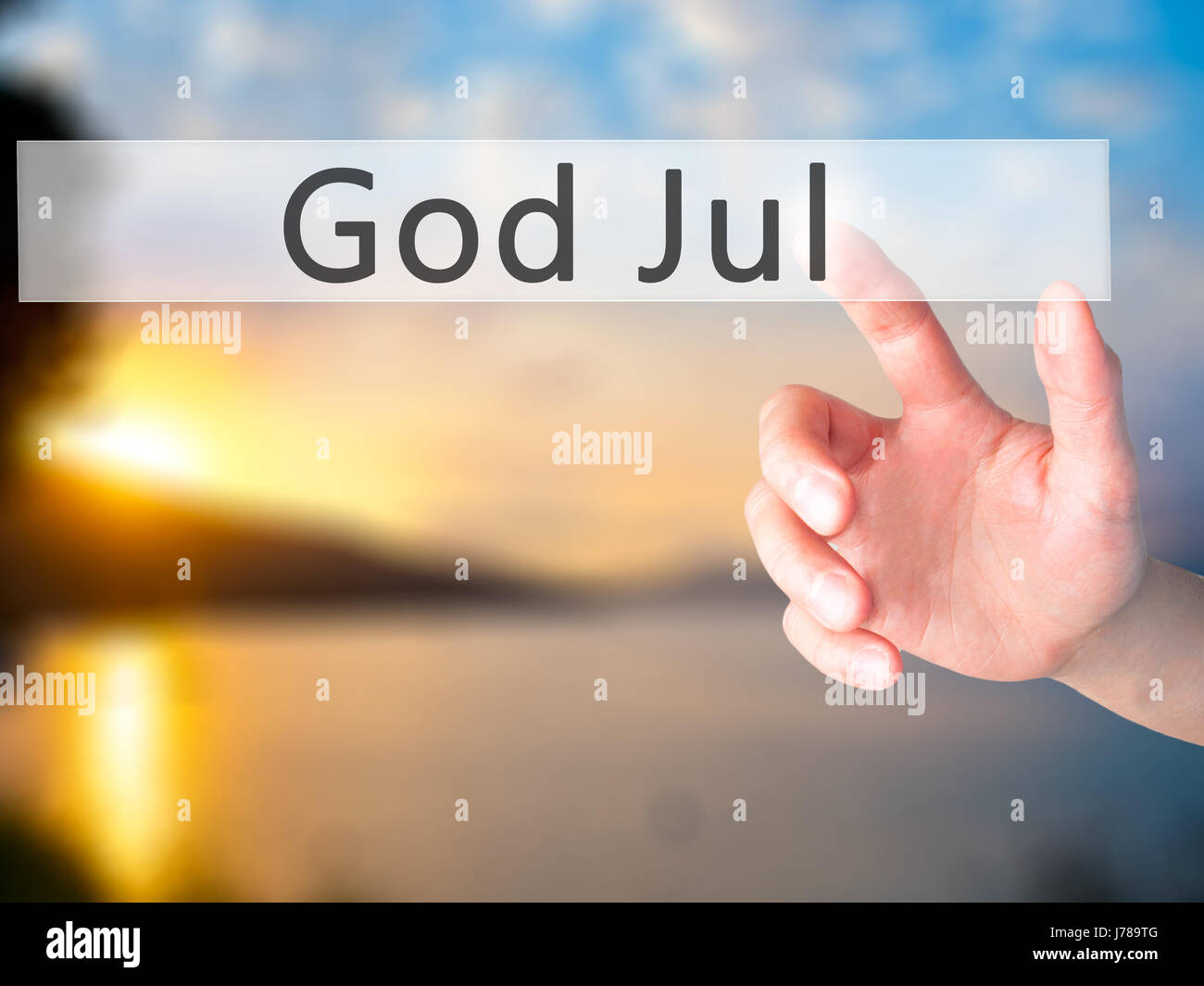 Dieu Jul Joyeux Noel En Suedois En Appuyant Sur Un Bouton Sur L Arriere Plan Flou Concept Le Commerce La Technologie Internet Concept Stock Photo Photo Stock Alamy