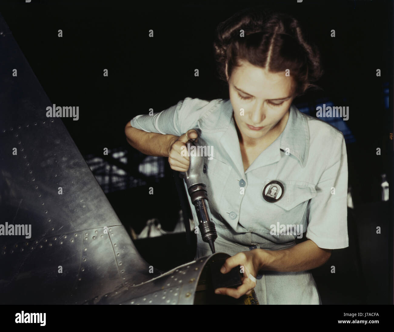 Une femme à riveter Naval Air Station Corpus Christi, Texas, 1942. Banque D'Images