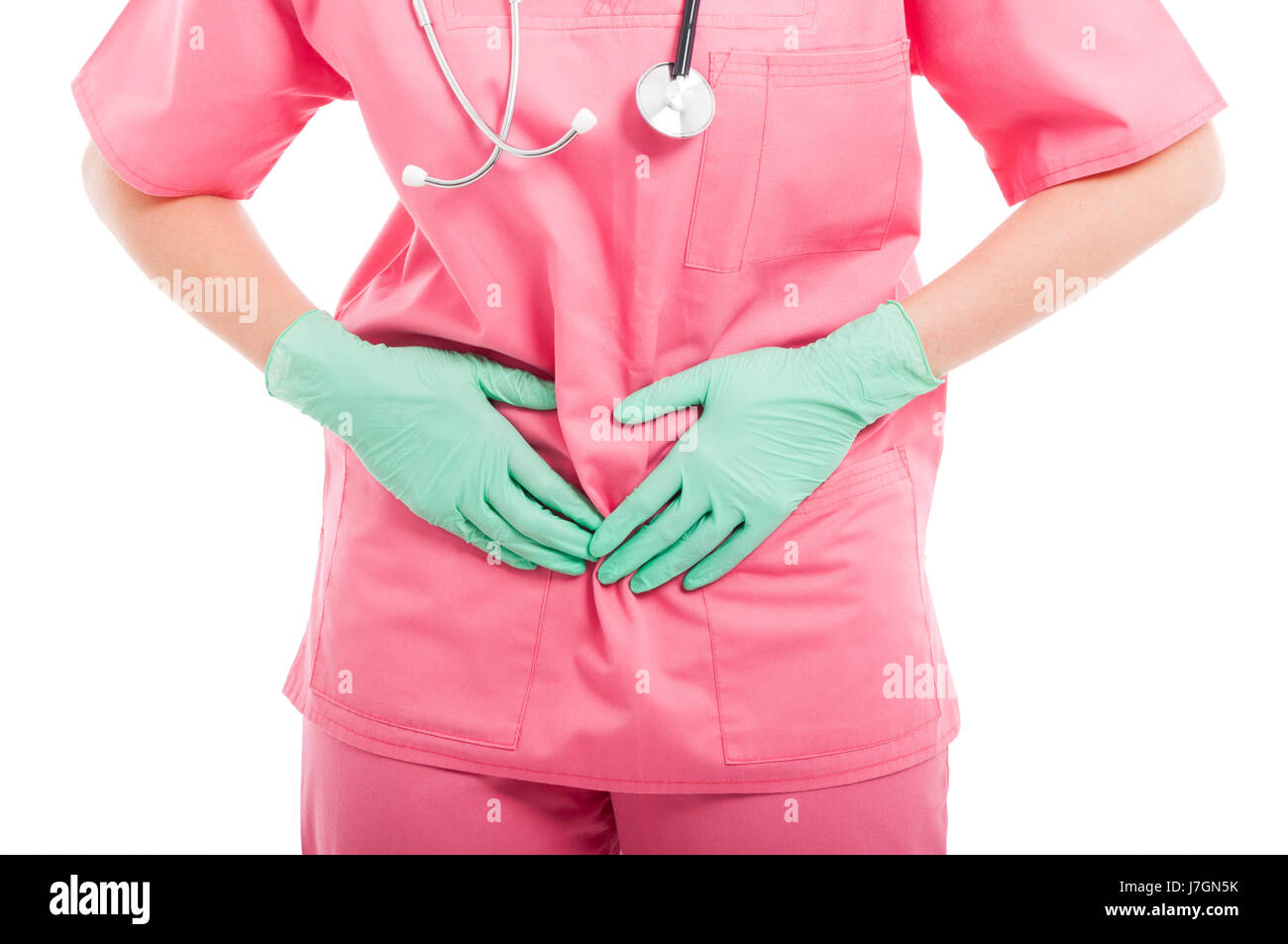 Close-up d'infirmières ayant des douleurs période tenant son abdomen isolé sur fond blanc Banque D'Images