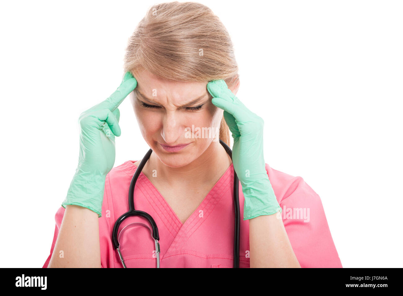 Femme infirmière médicale ayant une longueur d'ache isolé sur fond blanc avec l'espace texte copie Banque D'Images