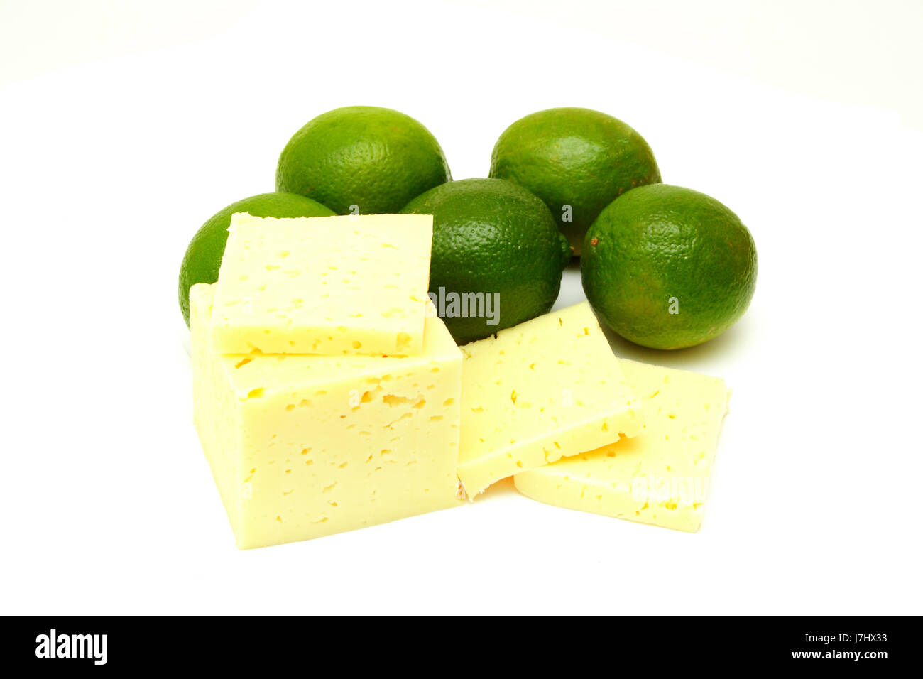 Tranches de fromage sur toile fond blanc avec des aliments aliment sucré unique Banque D'Images