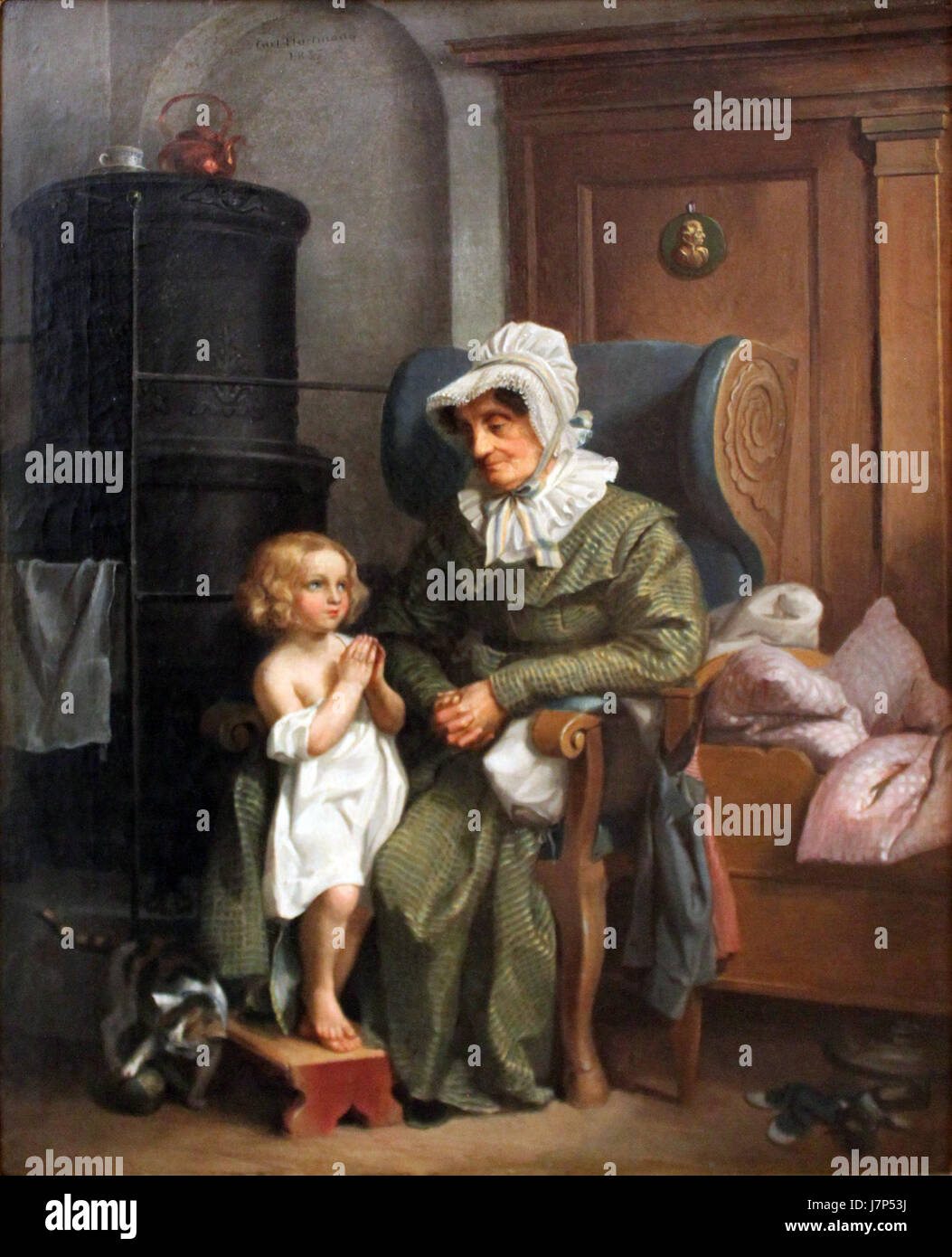Cette œuvre de 1837 de Hartmann met en scène une grand-mère avec un enfant hallucinatoire, dépeignant l'intensité émotionnelle et des thèmes symboliques liés aux perceptions modifiées et aux relations familiales. Banque D'Images