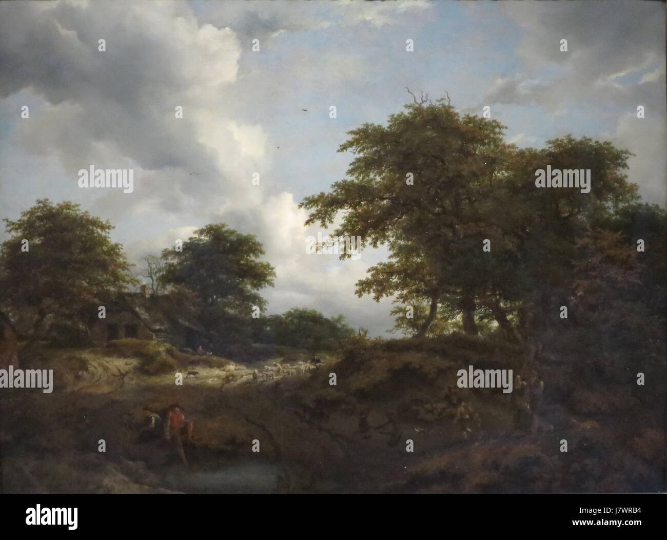 'Paysage boisé avec une piscine et des chiffres de Jacob van Ruisdael et Nicolaes Berchem Banque D'Images