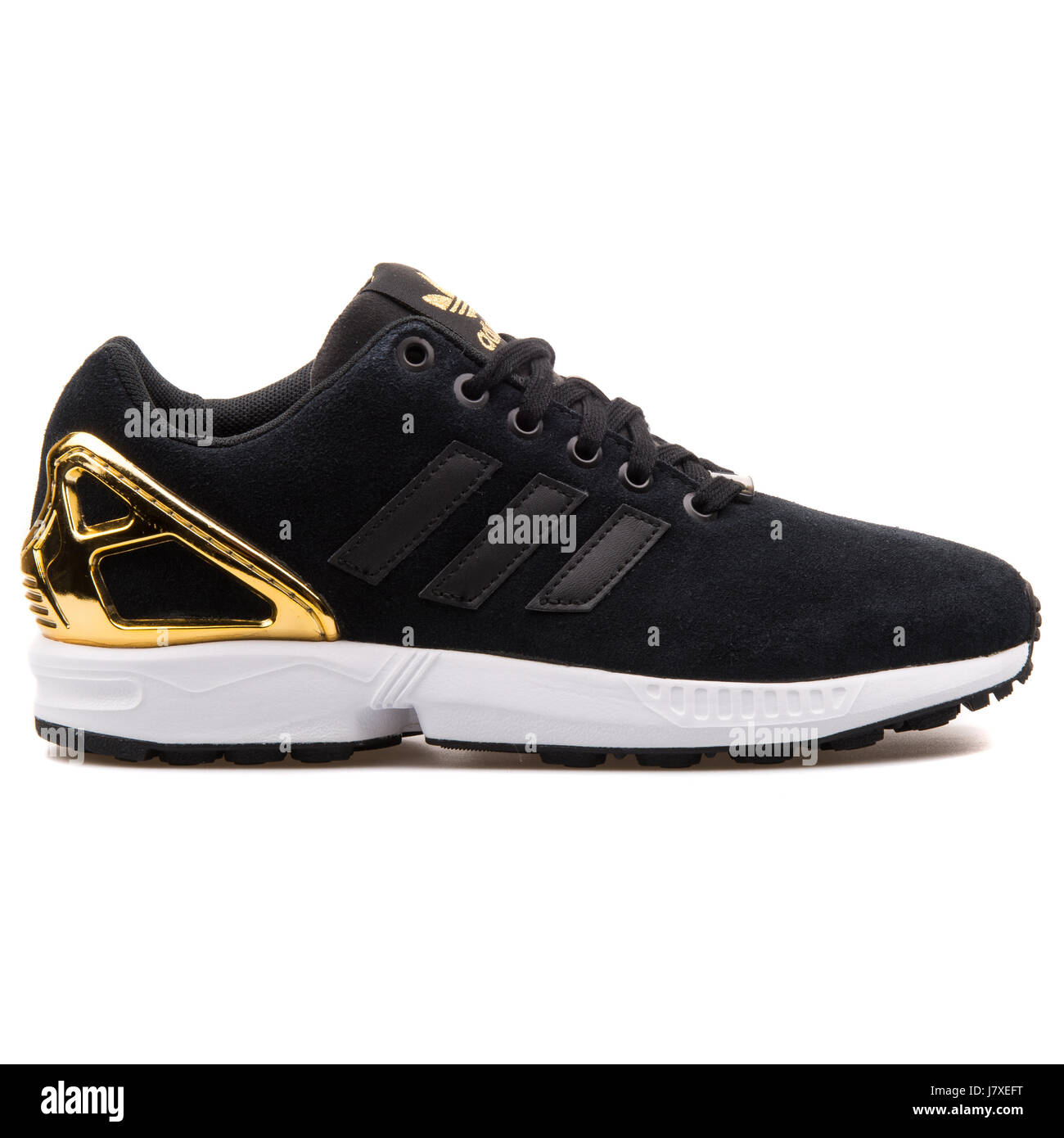 Flux Adidas ZX W Women's sneakers noir et or - B35319 Photo Stock - Alamy