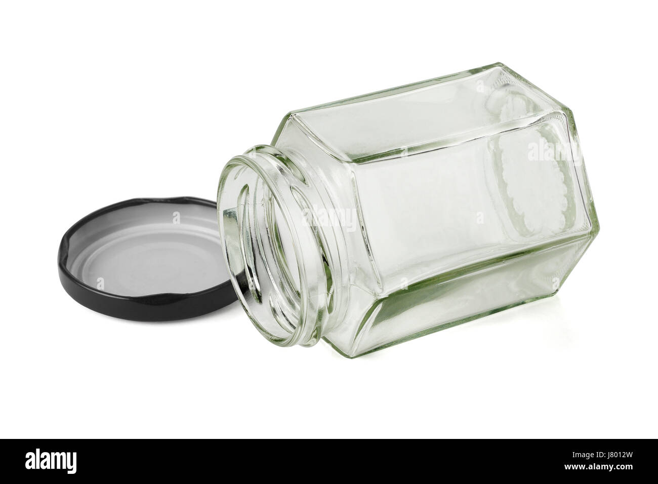 Forme hexagonale ouverte contenant de verre allongé sur fond blanc Banque D'Images