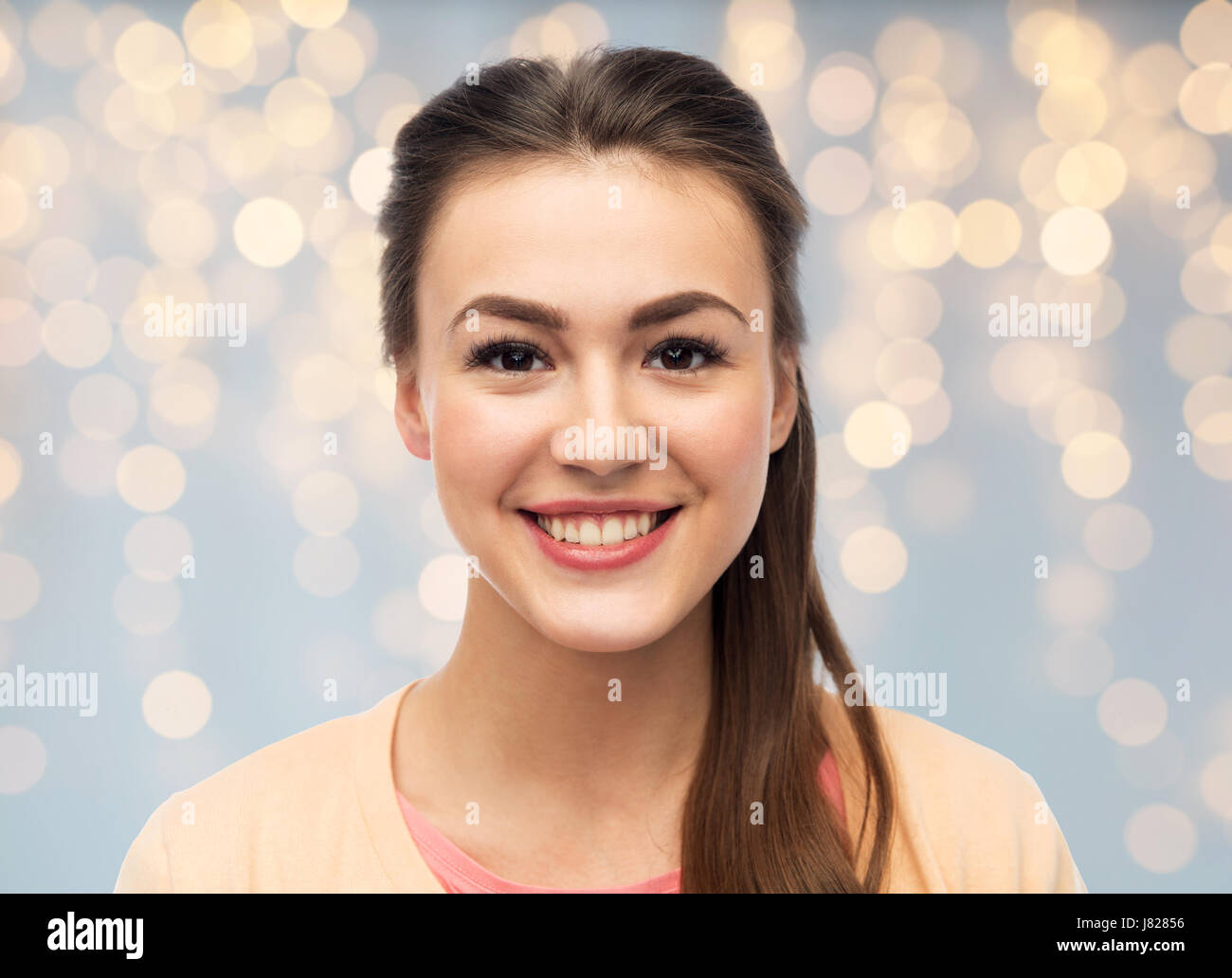 Visage de happy smiling young woman Banque D'Images