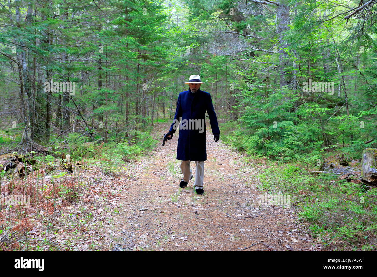 Un tueur avec une arme à feu la photo pour l'utiliser comme une couverture de livre Banque D'Images