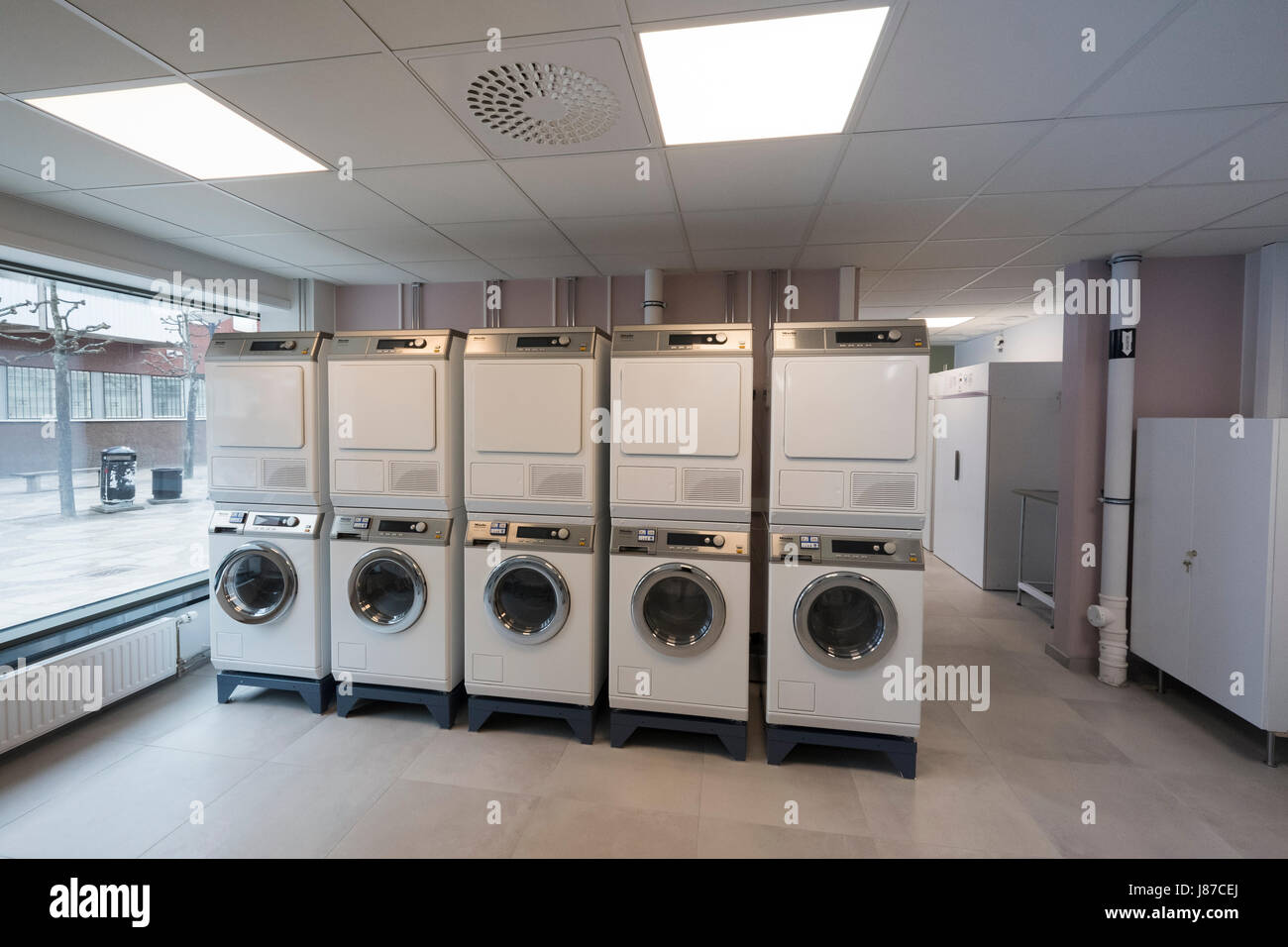 La salle de lavage pour un appartement, une chambre d'Tensta, Stockholm, Suède. Banque D'Images