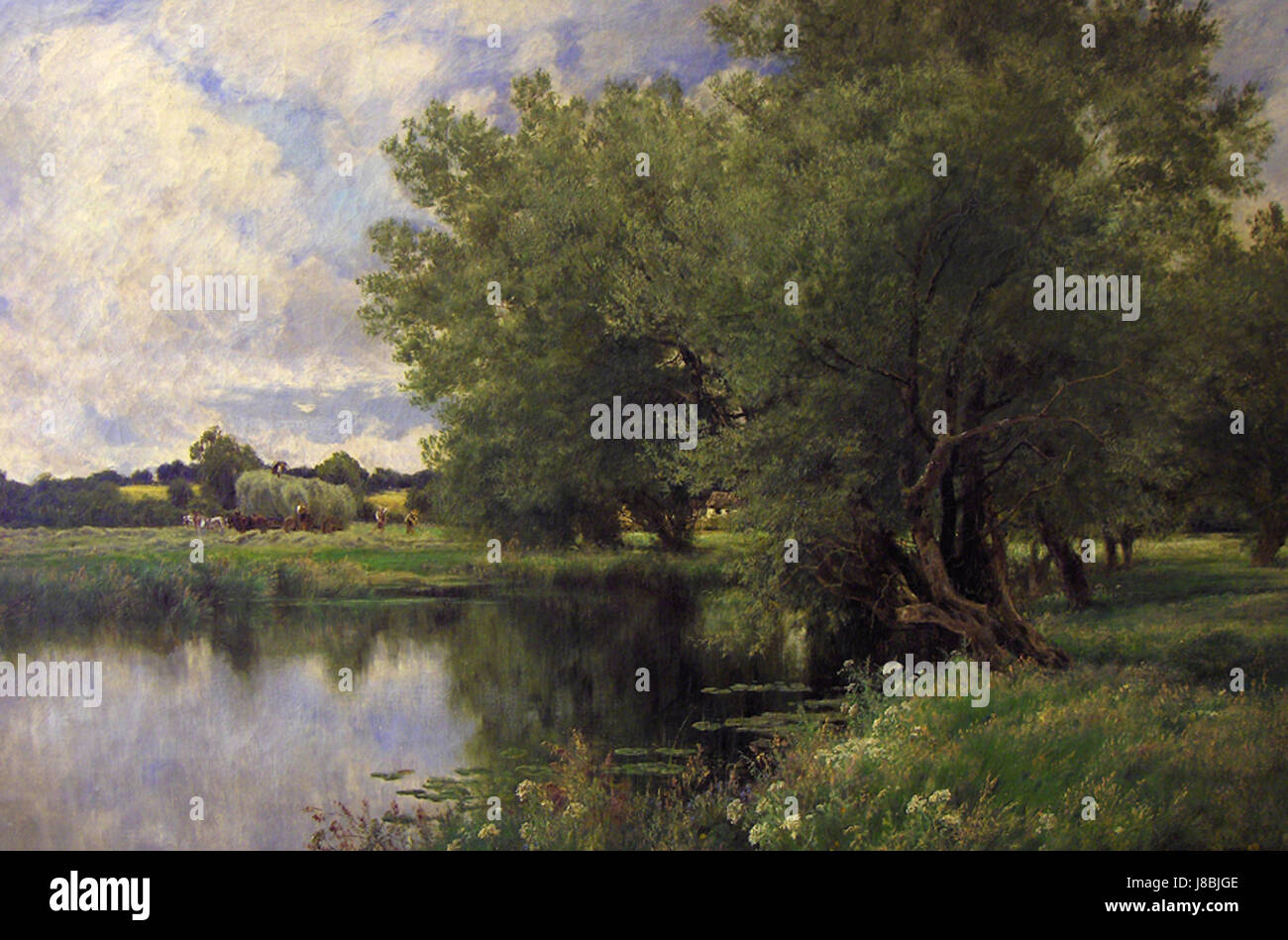 Image représentant la fenaison le long de la Tamise, reflétant la vie rurale en Angleterre. La scène met en lumière les pratiques agricoles le long de cette voie navigable emblématique. Banque D'Images