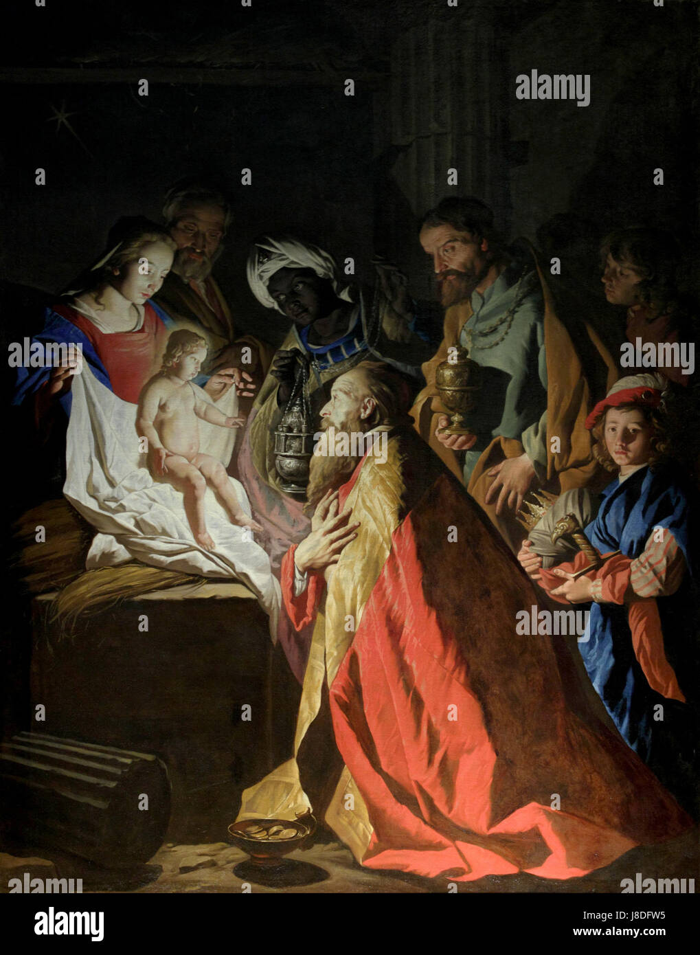 'L'Adoration des mages' fait référence à la représentation des trois Mages dans la tradition chrétienne. Cette œuvre illustre typiquement les Mages présentant des cadeaux à l’enfant Jésus dans une scène de nativité, un moment clé de l’art chrétien et de l’iconographie. Banque D'Images
