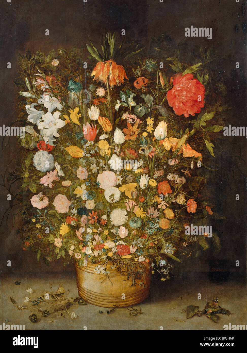 'Stilleven met Bloemen' de Jan Brueghel l'ancien est une célèbre peinture de nature morte représentant une variété de fleurs. Brueghel était connu pour son rendu exquis d'objets naturels, et ce travail montre son habileté à représenter des détails délicats et des couleurs vibrantes. La pièce est célébrée pour sa qualité réaliste et sa contribution à la tradition flamande de la peinture de natures mortes au XVIe siècle. Banque D'Images