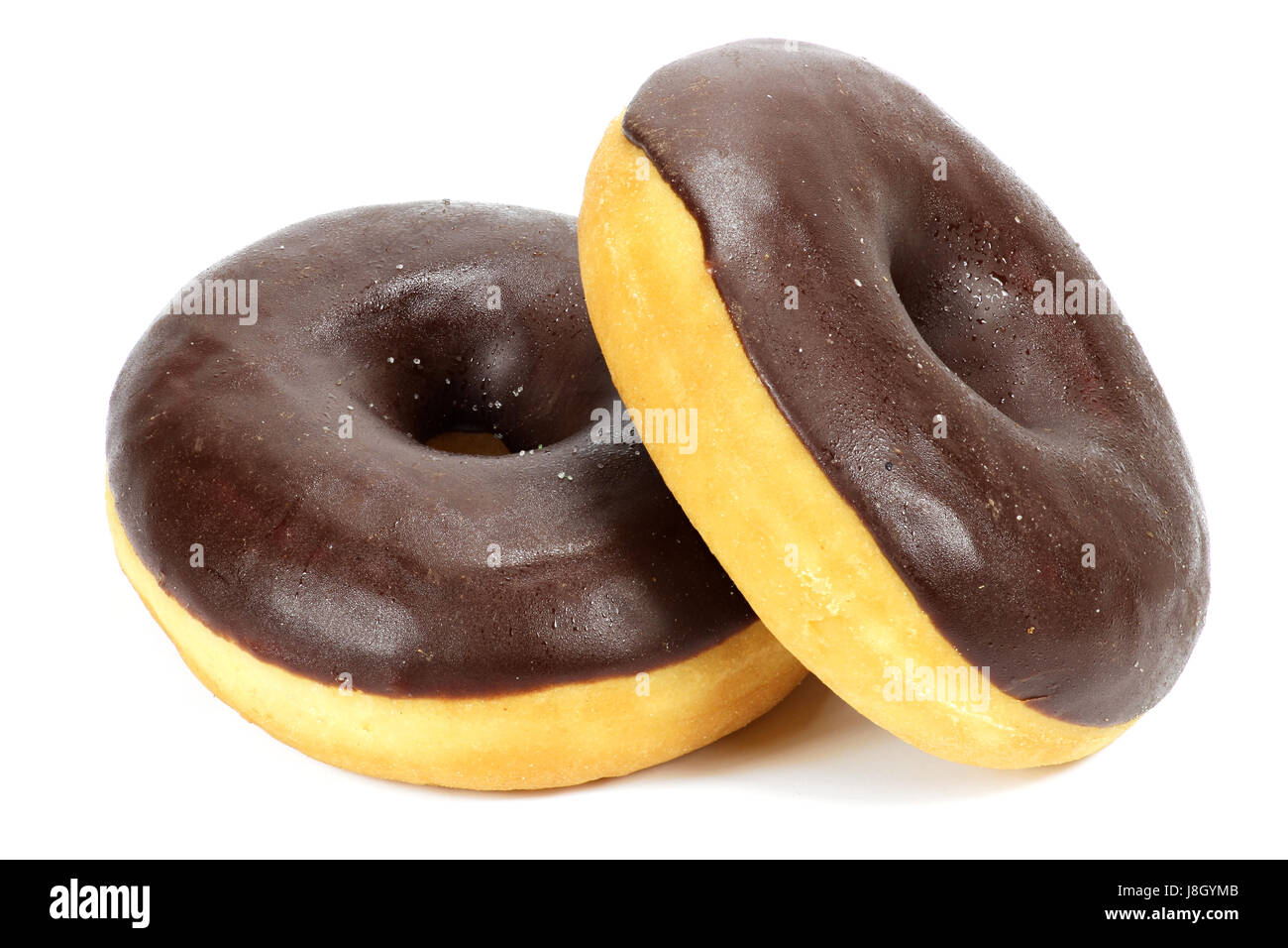 Les beignes glacés au chocolat isolé sur fond blanc Banque D'Images