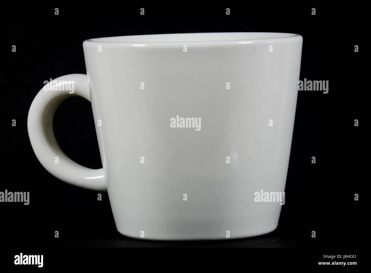 Tasse de café blanc sur fond noir Banque D'Images