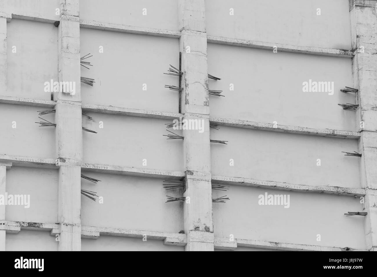 Les murs en béton sont de construction de gratte-ciel en arrière-plan de conception. Banque D'Images