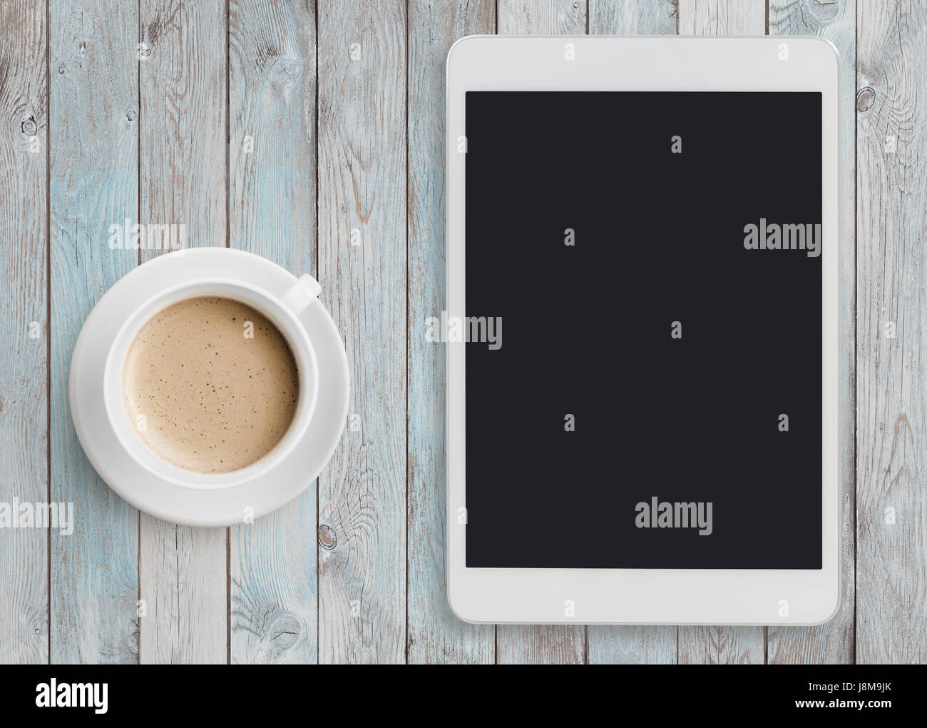 Tablet pc à ipad comme sur table avec Coffee cup Banque D'Images