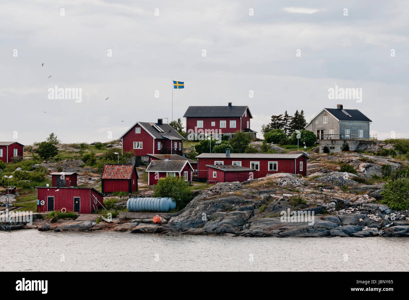 De petites maisons par la mer Banque D'Images