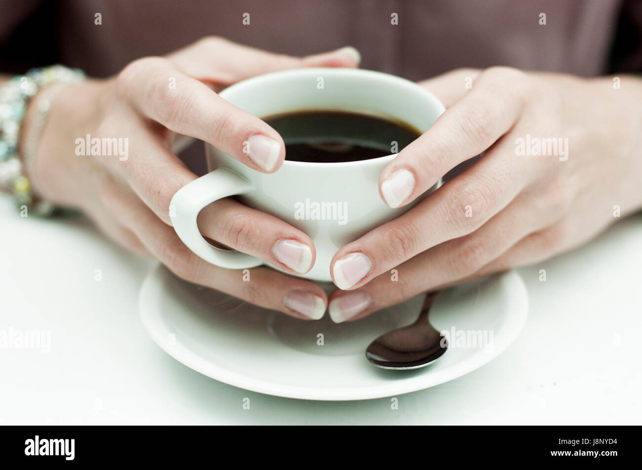 Woman having coffee Banque D'Images