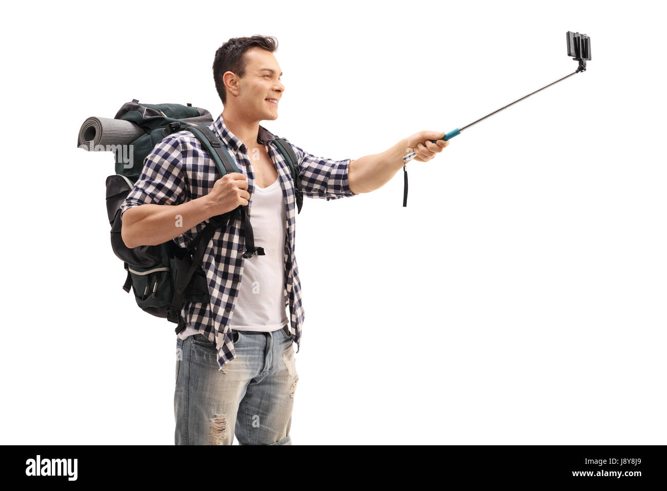 Prendre un randonneur avec un bâton selfies isolé sur fond blanc Banque D'Images