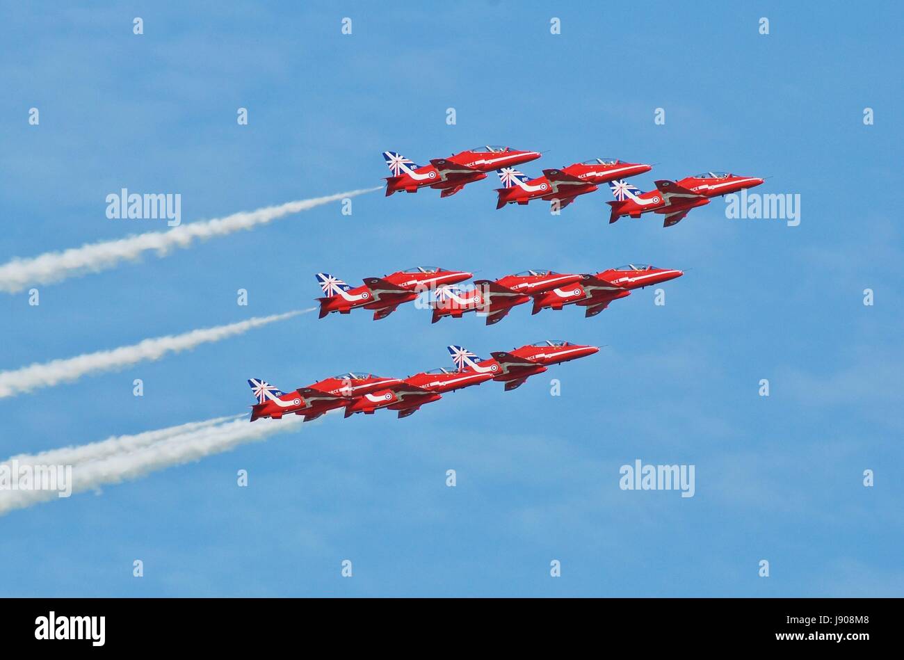 RAF aerobatic team afficher les flèches rouges affichage à l'Airshow 29-11-2013 à Eastbourne, Angleterre le 14 août 2014. Banque D'Images