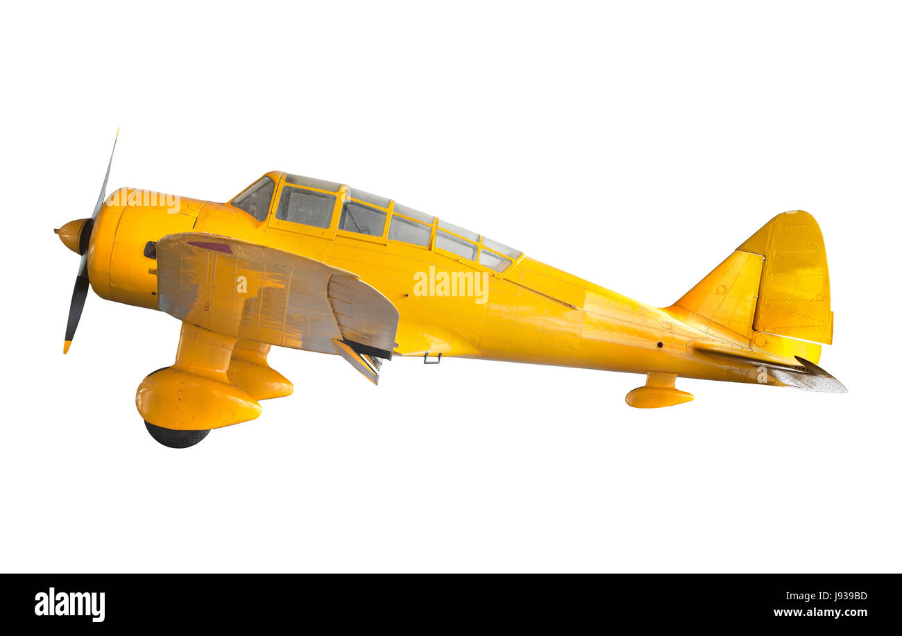 Vieux classique avion jaune isolé sur fond blanc Banque D'Images