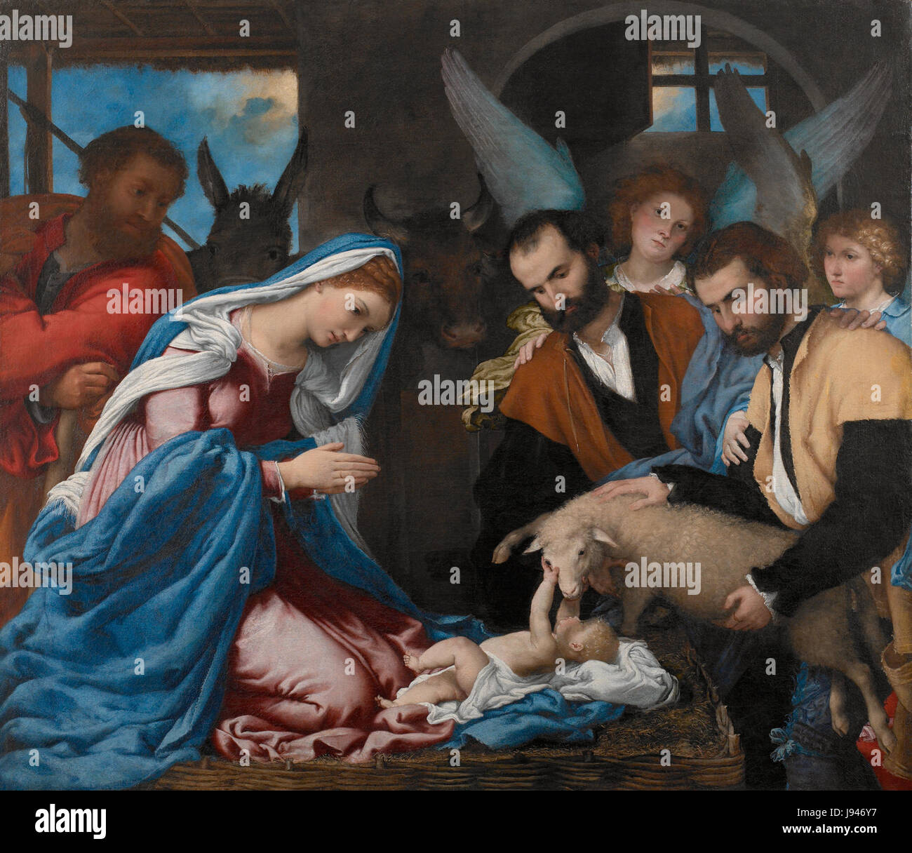 'L'Adoration des bergers' est une peinture religieuse de Lorenzo Lotto, représentant la scène de la nativité avec des bergers adorant le nouveau-né Jésus. Cette œuvre reflète les techniques artistiques de la Renaissance et le symbolisme religieux, mettant en valeur la maîtrise de Lotto dans la représentation de l'émotion humaine et des thèmes sacrés. Banque D'Images