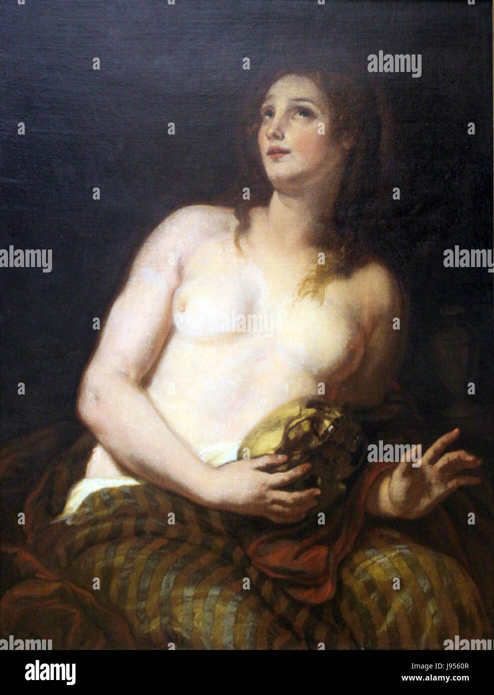 *Die reuige Maria Magdalena* est une peinture religieuse de Furini datant de 1641. Il représente la figure biblique de Marie-Madeleine dans une pose repentante, reflétant les thèmes de la rédemption et de la piété. Banque D'Images