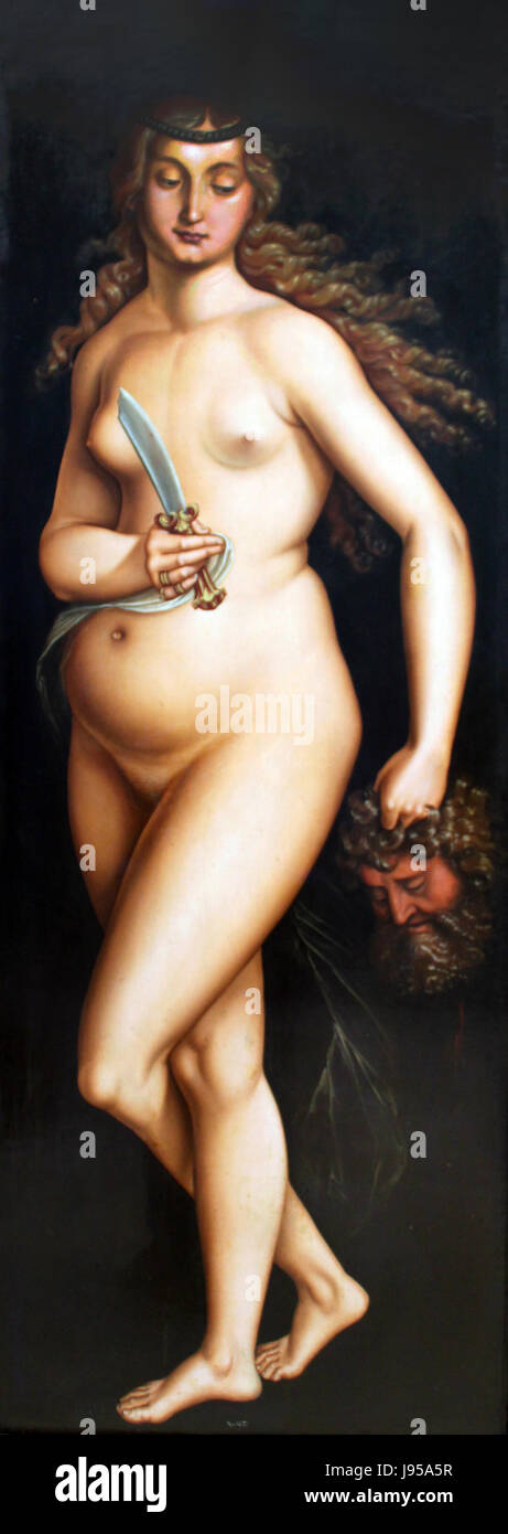 Judith mit dem Haupt des Holofernes de Hans Baldung est une peinture de 1525 qui dépeint l'histoire biblique de Judith décapitant le général assyrien Holofernes. Cette œuvre illustre la maîtrise de Baldung dans la représentation de scènes dramatiques et intenses. Banque D'Images