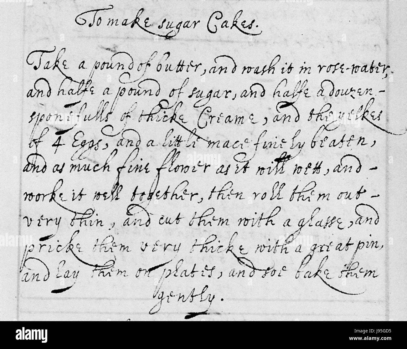 Sarah longe les gâteaux de sucre Banque D'Images