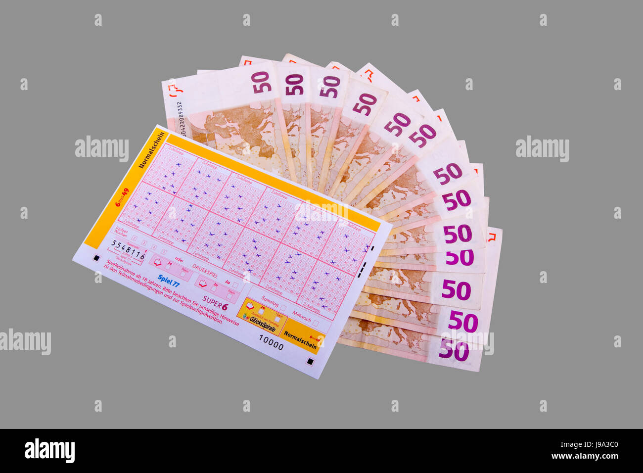 Billets de loterie et compartiments en espèces Banque D'Images