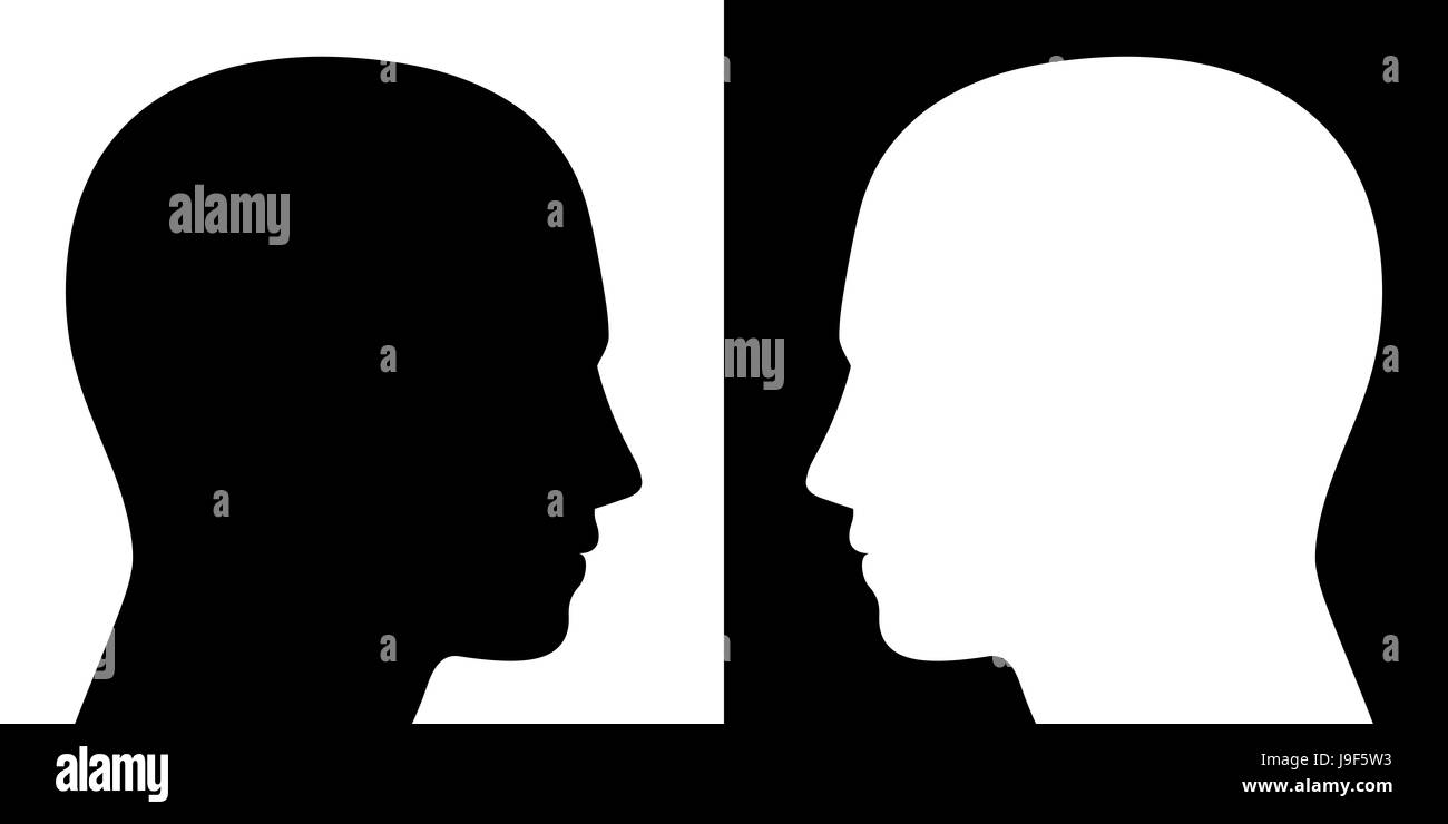 Point de vue opposé - deux têtes vers l'autre, l'un est noir sur blanc, l'autre converse, comme un symbole pour des opinions, idées contraires. Banque D'Images