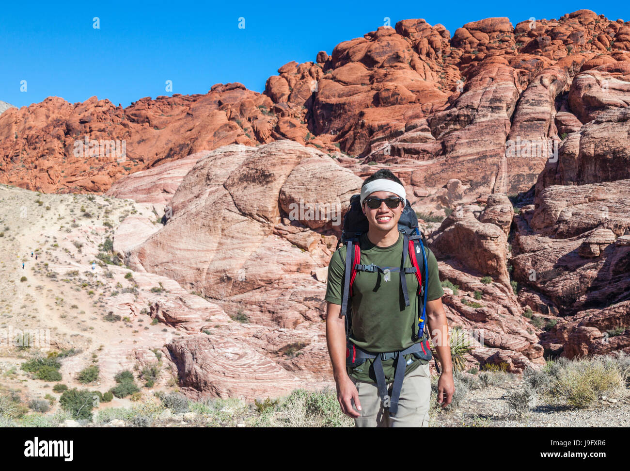 Randonnées homme au Red Rock Canyon National Conservation Area, qui est à environ 20 miles de Las Vegas Banque D'Images