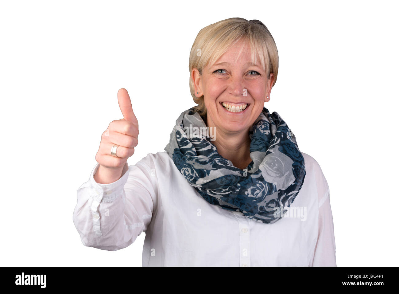 Blonde femme optimiste européen donne Thumbs up et sourires Banque D'Images