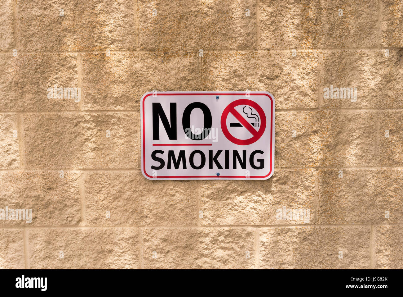 Aucun signe de fumer sur un mur Banque D'Images