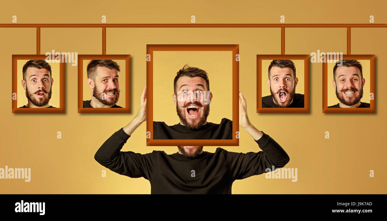 Jeune homme essayant sur ses émotions Banque D'Images