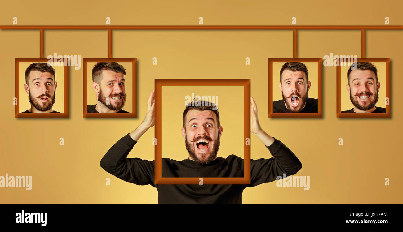 Jeune homme essayant sur ses émotions Banque D'Images