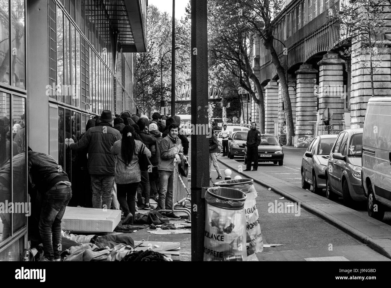 Migrants Paris Banque D'Images