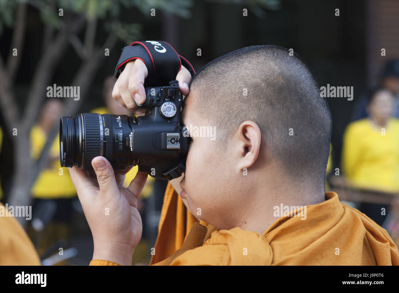 Thaïlande, Bangkok, moines,prendre des photos,page portrait, Banque D'Images