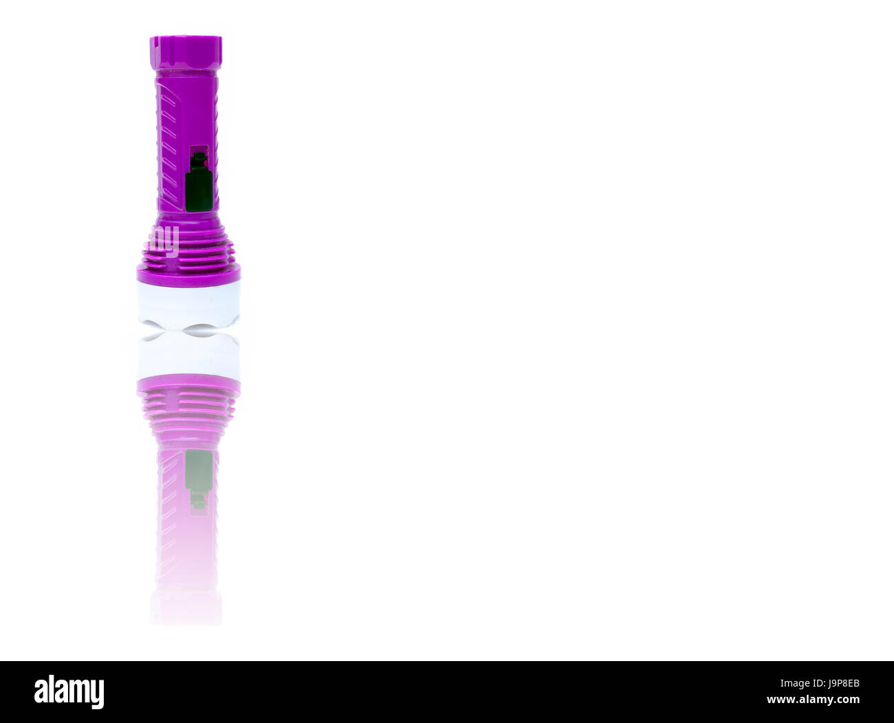 Les enfants jouet batterie torche, isolé sur blanc. Moins est plus. Banque D'Images