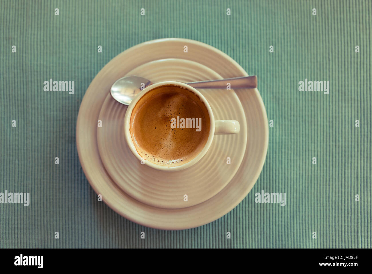 Espresso sur une serviette verte Banque D'Images