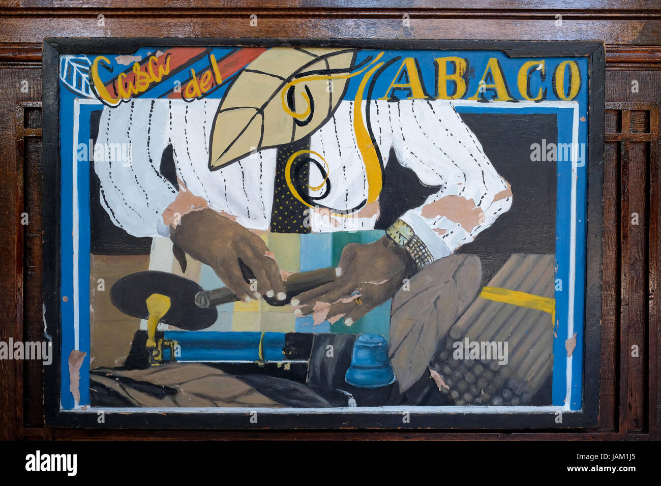 Signe de l'oeuvre peint à la main illustrant l'homme rouler des cigares est affiché à l'entrée de la Casa del Tabaco à Varadero, Cuba Banque D'Images Signe de l'oeuvre peint à la main illustrant l'homme rouler des cigares est affiché à l'entrée de la Casa del Tabaco à Varadero, Cuba Banque D'Images