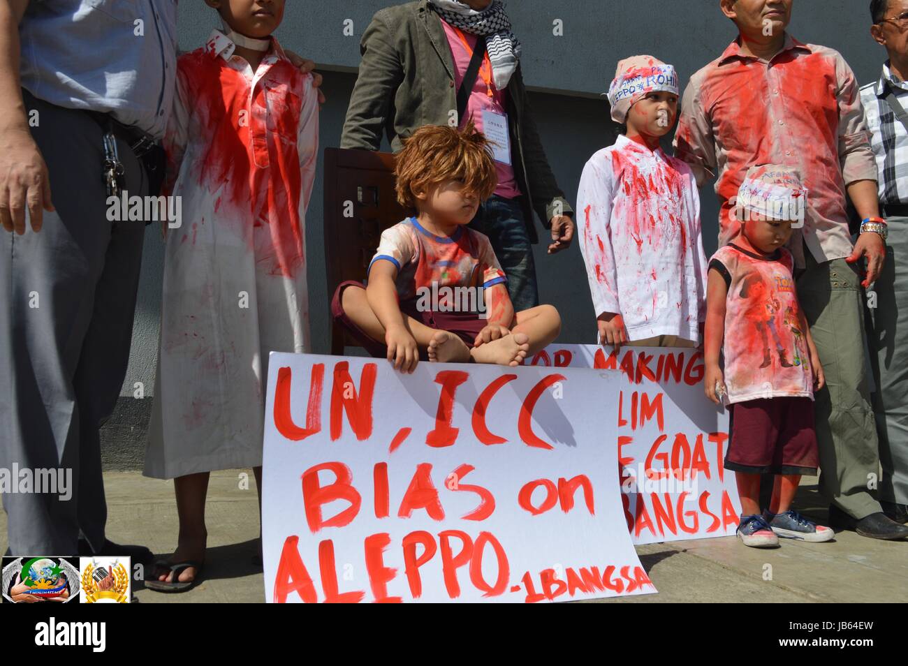 Quand le monde a appris ce qui est arrivé à Alep les Philippins musulmans se rassemblent en Quezon City Circle de s'unir en un rassemblement pour la paix à Alep. Banque D'Images