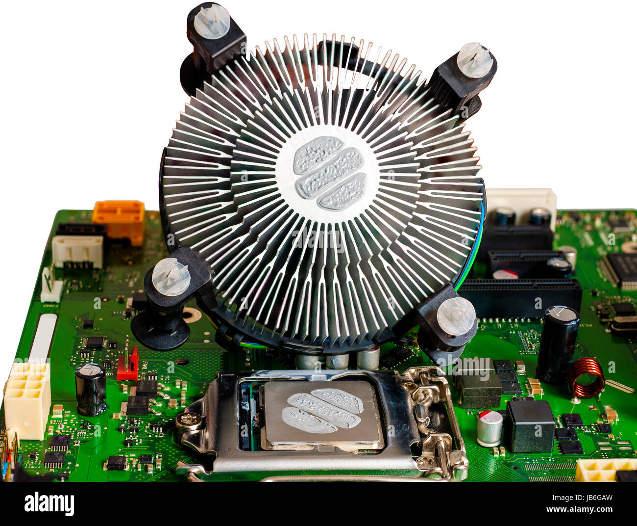 Le ventilateur de refroidissement du processeur et de la pâte thermique  appliquée avant de monter la carte mère Photo Stock - Alamy