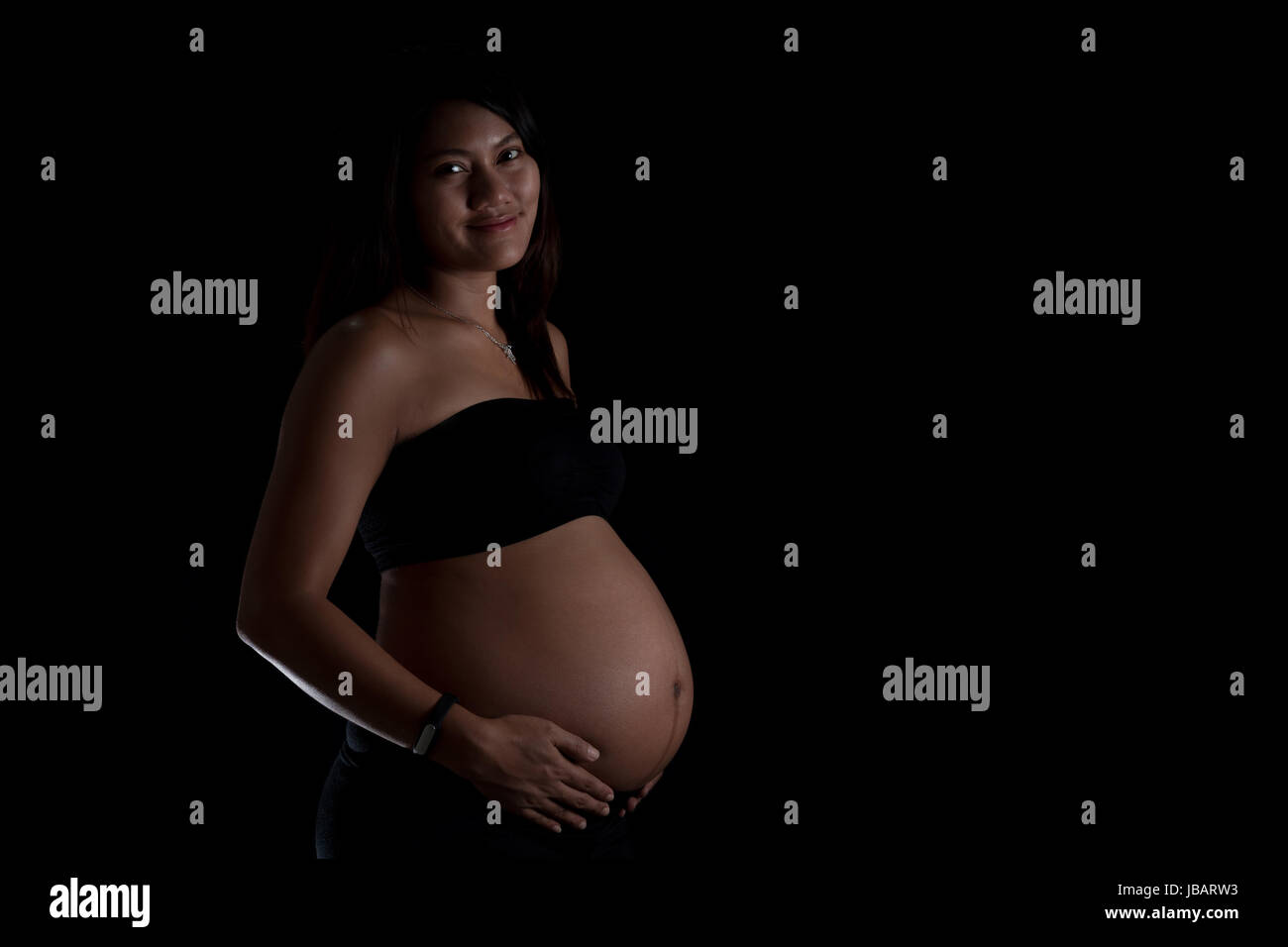 Femme enceinte asiatique Banque D'Images