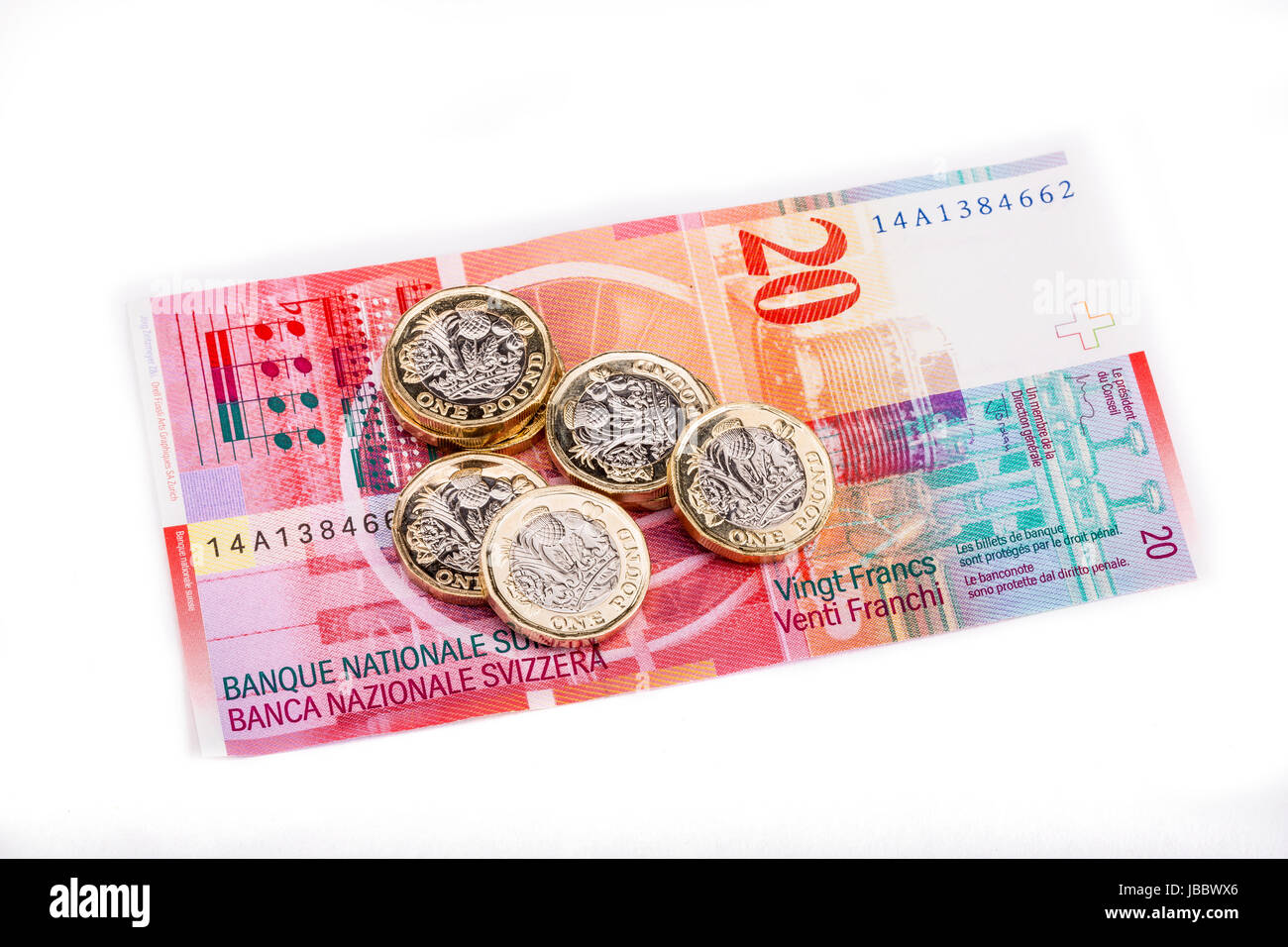 Une livre britannique des pièces en francs suisses des billets de banque Banque D'Images