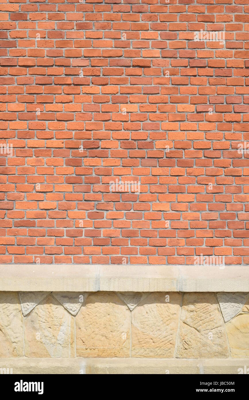 Mur de briques rouges et de grès background Banque D'Images