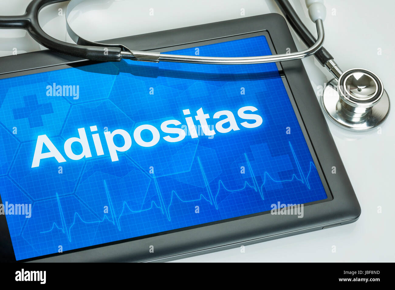 Tablet mit der diagnostiquer Adipositas auf dem Afficher Banque D'Images